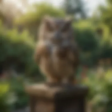 Lifelike Fake Owl in a Garden A lifelike fake owl perched in a garden